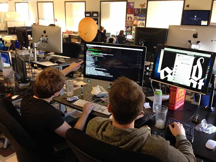 Two developers collaborting over some code.